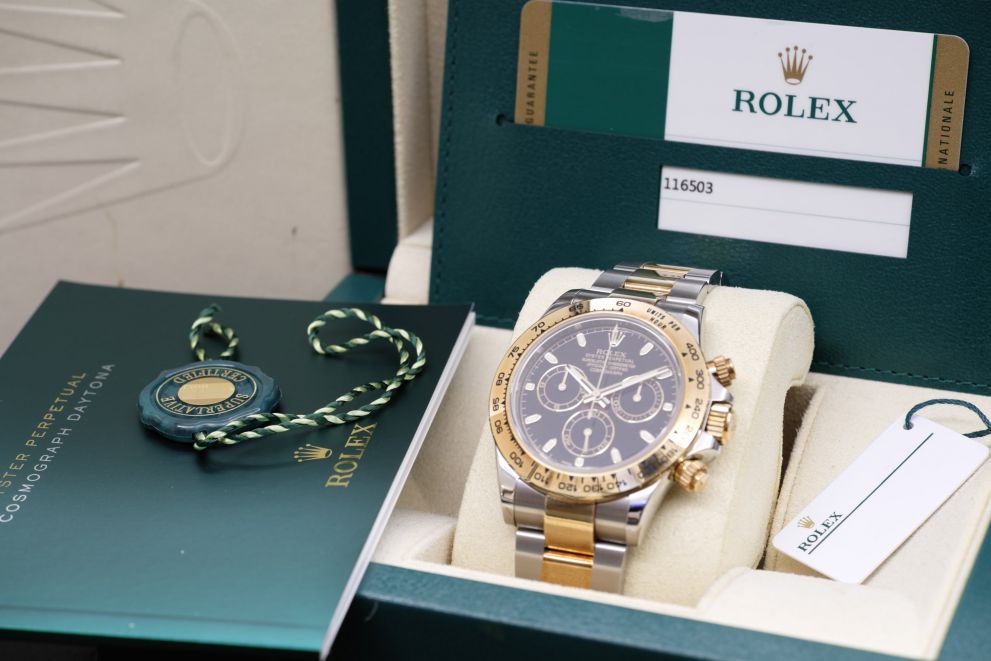 Rolex Daytona SS/ Gold 18kt Black dial TAG B/p Full set