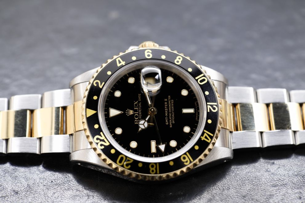 Rolex GMT-Master II Ref. 16713 SS / Gold 18kt Black dial Green sticker Top conditions