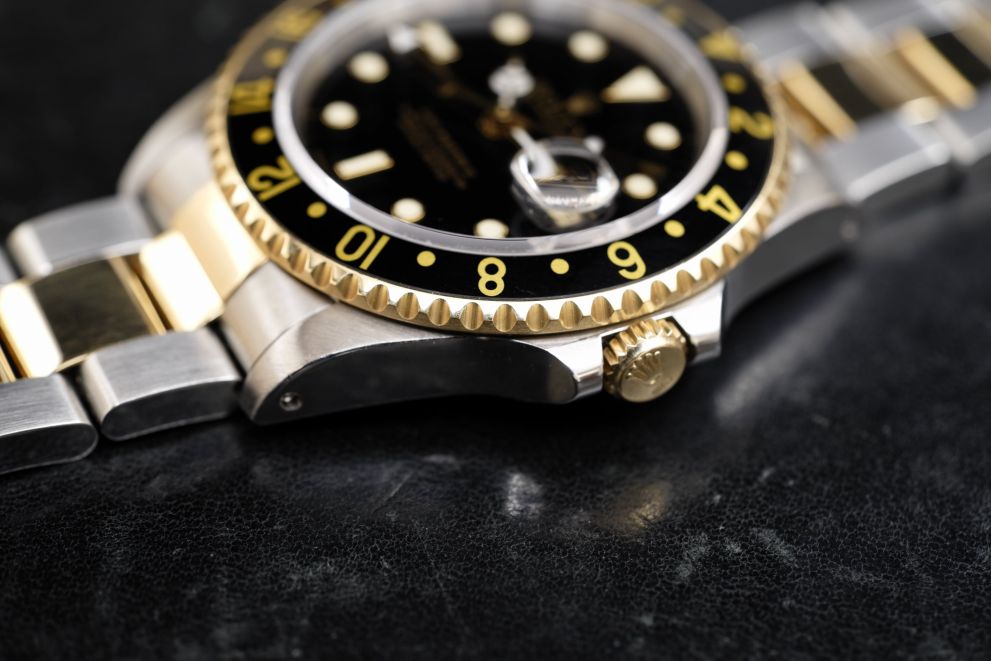 Rolex GMT-Master II Ref. 16713 SS / Gold 18kt Black dial Green sticker Top conditions